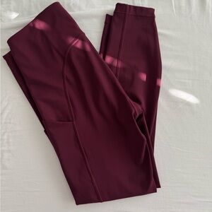 Athleta Ultimate Stash pocket 7/8 Tight in burgundy